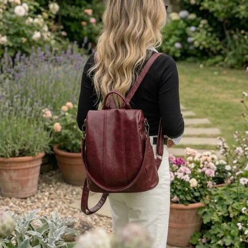 Deep Burgundy Compact Rounded Retro Rucksack With Vertical Central Stitching, Detachable Wear Strips And Short Top Carry Loop Backpack